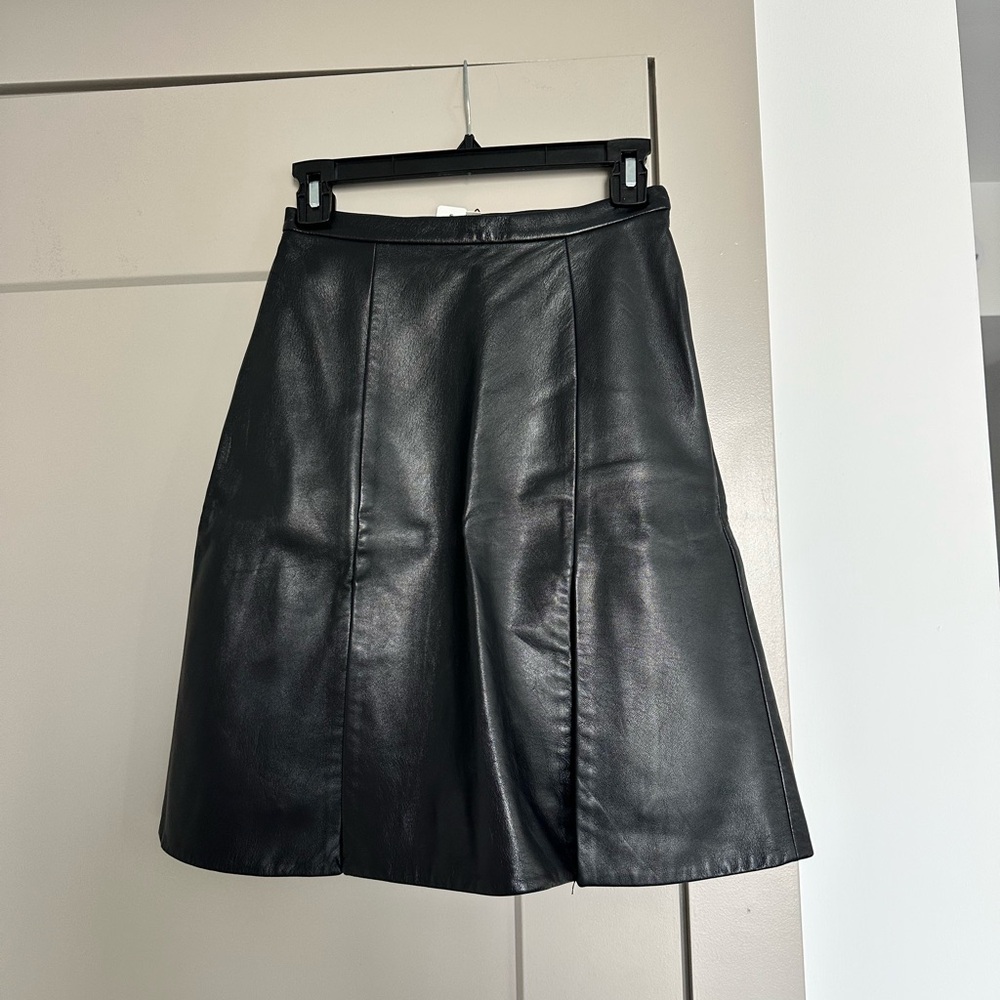 Rodarte x Openinf Ceremony black leather skirt with slits in front and back